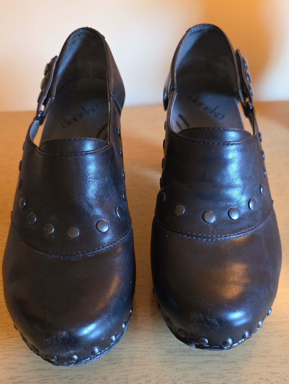 Dansko Black Leather Studded Clogs